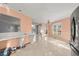 Bright dining room with tile floors and access to the back patio at 1489 New Hope Rd, Locust Grove, GA 30248