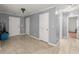 Spacious hallway with neutral walls and tile floors at 1489 New Hope Rd, Locust Grove, GA 30248