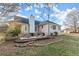 Ranch style home with backyard patio and landscaping at 1489 New Hope Rd, Locust Grove, GA 30248