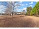 Ranch home with large yard and mature trees at 1489 New Hope Rd, Locust Grove, GA 30248