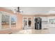 Eat-in kitchen with white cabinets and tile floor at 1489 New Hope Rd, Locust Grove, GA 30248
