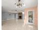 Living room with fireplace and tile floors at 1489 New Hope Rd, Locust Grove, GA 30248