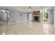 Living room with fireplace and tile floors at 1489 New Hope Rd, Locust Grove, GA 30248