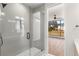 Bathroom with walk-in shower and window overlooking backyard at 105 Georgia Se Ave # 5, Atlanta, GA 30312