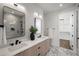 Modern bathroom with double vanities, large mirrors, and stylish tile flooring at 105 Georgia Se Ave # 5, Atlanta, GA 30312