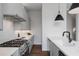 Modern kitchen with stainless steel appliances, white countertops, and hardwood floors at 105 Georgia Se Ave # 5, Atlanta, GA 30312