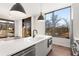 Modern kitchen with white quartz countertops and stainless steel appliances at 105 Georgia Se Ave # 5, Atlanta, GA 30312
