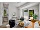 Inviting living room featuring modern decor, large windows, and stylish seating, creating a cozy atmosphere at 105 Georgia Se Ave # 5, Atlanta, GA 30312