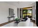 Cozy living room with large windows, comfortable seating, and a view of the backyard at 105 Georgia Se Ave # 5, Atlanta, GA 30312