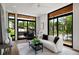 Bright living room features an open layout with views of the outside and abundant natural light at 105 Georgia Se Ave # 5, Atlanta, GA 30312