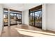 Bright living room with hardwood floors and large sliding glass doors at 105 Georgia Se Ave # 5, Atlanta, GA 30312