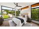 Beautiful bedroom with hardwood floors, a ceiling fan and large windows offering bright natural light and outdoor views at 105 Georgia Se Ave # 5, Atlanta, GA 30312