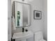 Stylish powder room featuring modern fixtures, a sleek mirror, and neutral decor at 105 Georgia Se Ave # 5, Atlanta, GA 30312