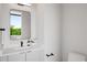 Modern powder room features a sleek mirror, stylish vanity, and contemporary fixtures for a clean and elegant space at 105 Georgia Se Ave # 5, Atlanta, GA 30312