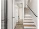 Modern staircase with dark wood steps and metal railing at 105 Georgia Se Ave # 5, Atlanta, GA 30312