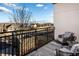 Private balcony with seating area and neighborhood view at 3351 Orwell Way # 2206, Cumming, GA 30041