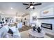 Open living space with kitchen and fireplace at 3351 Orwell Way # 2206, Cumming, GA 30041
