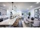 Open concept kitchen, dining, and living area with hardwood floors at 3351 Orwell Way # 2206, Cumming, GA 30041