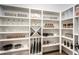 Spacious walk-in pantry with ample shelving for storage at 3351 Orwell Way # 2206, Cumming, GA 30041
