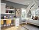 Cozy bedroom with built-in desk, white canopy bed, and natural light at 7170 Pond View Dr, Cumming, GA 30028