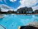 A refreshing community pool provides a perfect spot to unwind with ample deck space for relaxation and socialization at 7170 Pond View Dr, Cumming, GA 30028