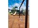 The community playground features swings and slides for to enjoy outdoor fun and active play in a safe environment at 7170 Pond View Dr, Cumming, GA 30028