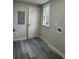 Laundry room with vinyl flooring and a window at 10033 Florence Cir, Villa Rica, GA 30180