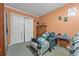 Bedroom with double closet and seating area at 145 Turning Pt, Stockbridge, GA 30281