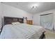 Bedroom with a double bed, dresser, and carpet flooring at 145 Turning Pt, Stockbridge, GA 30281