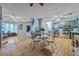 Open concept kitchen and dining area with teal cabinets at 145 Turning Point, Stockbridge, GA 30281