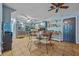 Kitchen with teal cabinets, stainless steel appliances, and tile floor at 145 Turning Pt, Stockbridge, GA 30281