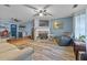 Living Room with hardwood floors, fireplace, and ceiling fan at 145 Turning Pt, Stockbridge, GA 30281