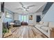 Spacious living room with hardwood floors, fireplace and neutral colors at 145 Turning Pt, Stockbridge, GA 30281