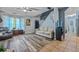 Open concept living room and kitchen with hardwood and tile floors at 145 Turning Pt, Stockbridge, GA 30281