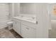 Bathroom with double vanity, bathtub, and toilet at 37 Willow Green Trce, Dallas, GA 30157