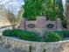 Brick community entrance with landscaping and Palisades signage at 37 Willow Green Trce, Dallas, GA 30157