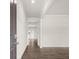 Bright entryway with hardwood floors and an open view to the living room at 37 Willow Green Trce, Dallas, GA 30157