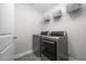 Laundry room with side-by-side washer and dryer, and shelving at 384 Niles Ct # 2, Marietta, GA 30060