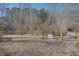 Trailhead entrance with a no littering sign at 605 Spruce Dr, Pine Lake, GA 30072