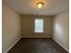 Spacious bedroom with carpet and window at 1937 Marbut Forest Dr, Lithonia, GA 30058