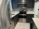 Modern kitchen with stainless steel appliances and white countertops at 1683 Briarcliff Ne Rd # 4, Atlanta, GA 30306