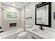 Updated bathroom with a white vanity and modern fixtures at 2253 Bonnybrook Sw Way, Atlanta, GA 30311