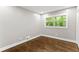 Bright bedroom featuring hardwood floors and neutral walls at 2253 Bonnybrook Sw Way, Atlanta, GA 30311