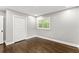 Bright bedroom with hardwood floors and large windows at 2253 Bonnybrook Sw Way, Atlanta, GA 30311
