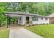 Newly renovated ranch home with driveway and landscaping at 2253 Bonnybrook Sw Way, Atlanta, GA 30311