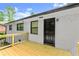 White brick house with a new deck and black accents at 2253 Bonnybrook Sw Way, Atlanta, GA 30311