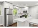 Modern kitchen with stainless steel appliances and white cabinets at 2253 Bonnybrook Sw Way, Atlanta, GA 30311