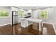 Open concept kitchen with island and stainless steel appliances at 2253 Bonnybrook Sw Way, Atlanta, GA 30311