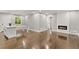 Spacious living area with hardwood floors and fireplace at 2253 Bonnybrook Sw Way, Atlanta, GA 30311