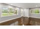 Bright living room with hardwood floors and large windows at 2253 Bonnybrook Sw Way, Atlanta, GA 30311